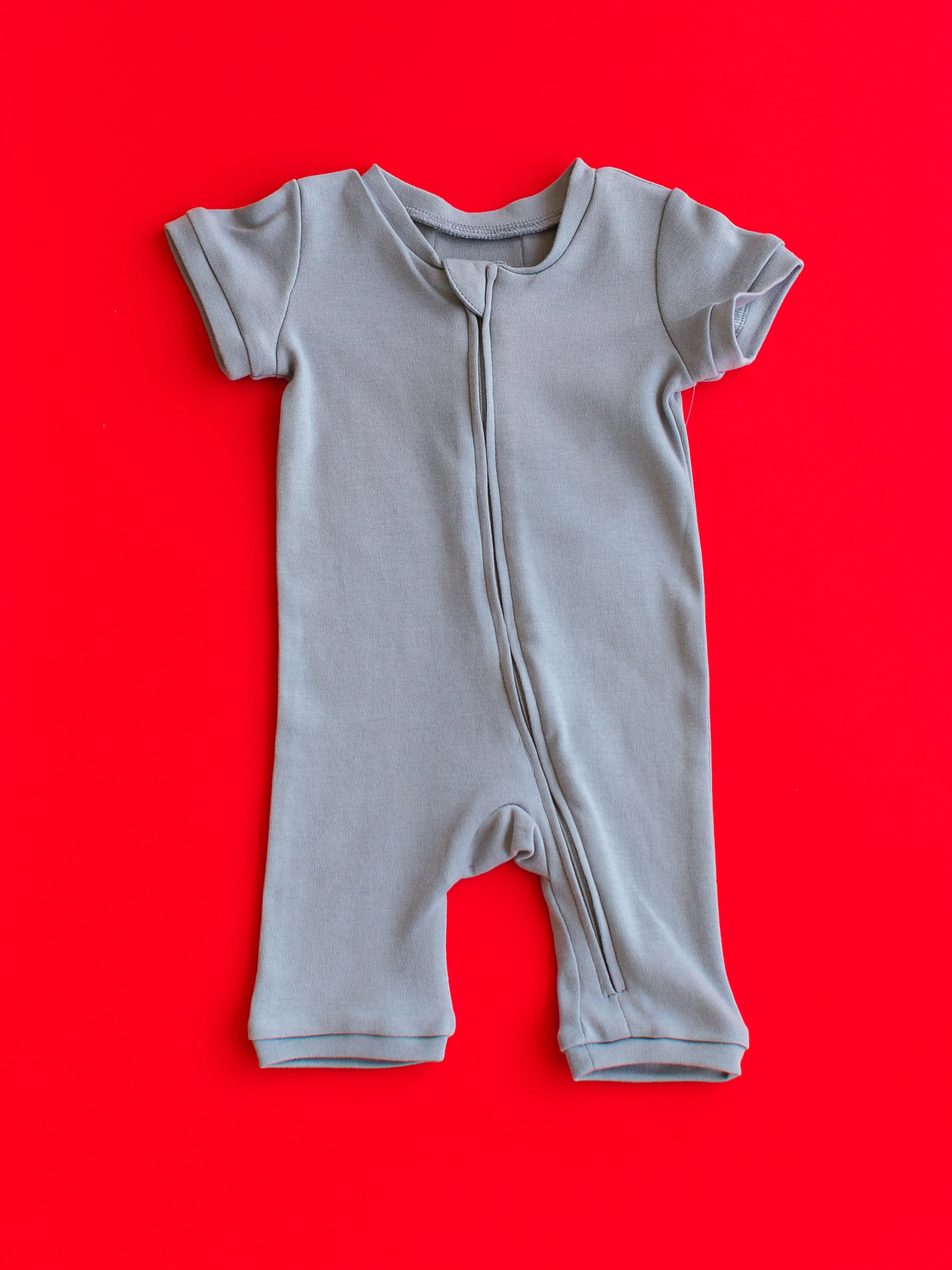 Organic Short Sleeve Zip Romper -  Colors